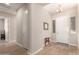 Bright foyer with wood-look tile flooring and neutral walls at 2456 E Lindrick Dr, Gilbert, AZ 85298