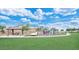 Community playground with playset and covered picnic area at 2456 E Lindrick Dr, Gilbert, AZ 85298