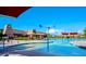 Community pool with water features and lounge chairs at 2456 E Lindrick Dr, Gilbert, AZ 85298