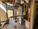 Unfinished kitchen area with exposed framing and plumbing at 258 E Franklin Ave, Mesa, AZ 85210