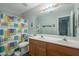 Bathroom with double sinks and a shower/tub combo at 3339 E Tonopah Dr, Phoenix, AZ 85050