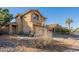 Two-story house with attached garage and desert landscaping at 3339 E Tonopah Dr, Phoenix, AZ 85050