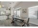 Eat-in kitchen with white cabinets, stainless steel appliances, and a gray island at 3339 E Tonopah Dr, Phoenix, AZ 85050