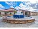 Circular fountain with blue tile accents at 4735 E Azalea Dr, Gilbert, AZ 85298