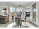 Kitchen breakfast nook with three chairs and large windows at 4735 E Azalea Dr, Gilbert, AZ 85298