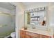 Bathroom with vanity, shower, and toilet at 5525 E Thomas Rd # N1, Phoenix, AZ 85018