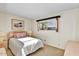 Bright bedroom with a double bed and window at 5525 E Thomas Rd # N1, Phoenix, AZ 85018