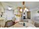 Galley-style kitchen with white cabinets and tiled floor at 5525 E Thomas Rd # N1, Phoenix, AZ 85018
