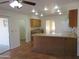 Bright kitchen features an island, tiled floor, and ample cabinetry at 814 W Hononegh Dr, Phoenix, AZ 85027