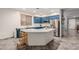 Modern kitchen with blue cabinets, stainless steel appliances, and a large island at 8366 W Carol Ct, Peoria, AZ 85345