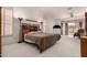 Large bedroom with a king-size bed, and access to a private patio at 9501 E Cherrywood Dr, Sun Lakes, AZ 85248