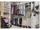 Spacious walk-in closet with ample shelving and hanging space at 9501 E Cherrywood Dr, Sun Lakes, AZ 85248