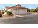 Single story home with three car garage and desert landscaping at 9501 E Cherrywood Dr, Sun Lakes, AZ 85248