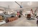 Garage workshop area with workbench and storage at 9501 E Cherrywood Dr, Sun Lakes, AZ 85248