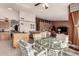 Open kitchen with breakfast nook and views to Gathering room at 9501 E Cherrywood Dr, Sun Lakes, AZ 85248