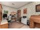 Home office with two desks and built-in shelving at 9501 E Cherrywood Dr, Sun Lakes, AZ 85248