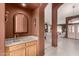 Convenient wet bar with sink and wood cabinetry at 9501 E Cherrywood Dr, Sun Lakes, AZ 85248