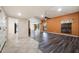 Living room with wood-look flooring, ceiling fan, and an open concept layout at 1462 Leisure World --, Mesa, AZ 85206