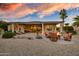 Spacious backyard patio with fire pit and seating area, perfect for outdoor entertaining at 19521 N Copper Canyon Ct, Surprise, AZ 85387