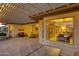 Covered patio with glass doors leading to the interior at 19521 N Copper Canyon Ct, Surprise, AZ 85387