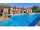 Inviting community pool with water features and shaded seating areas at 20100 N 78Th Pl # 3092, Scottsdale, AZ 85255