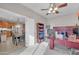 Home office with a view of the dining area and kitchen at 2417 W Apache Rain Rd, Phoenix, AZ 85085