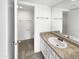 Bathroom with vanity, mirror, and tiled floor at 3228 W Glendale Ave # 118, Phoenix, AZ 85051