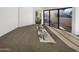 Spacious bedroom filled with natural light from large windows at 3228 W Glendale Ave # 118, Phoenix, AZ 85051