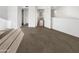 Bright, carpeted bedroom with natural light and an open doorway at 3228 W Glendale Ave # 118, Phoenix, AZ 85051