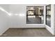 Bright bedroom with large window overlooking backyard at 3228 W Glendale Ave # 118, Phoenix, AZ 85051
