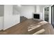 Living room with fireplace, wood floors, and large windows at 3228 W Glendale Ave # 118, Phoenix, AZ 85051