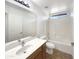 Simple bathroom with single vanity, tub/shower combo, and tile flooring at 4481 E Sundance Ct, Gilbert, AZ 85297