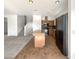Kitchen featuring wooden cabinets, black appliances, and an island at 4481 E Sundance Ct, Gilbert, AZ 85297