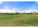 Expansive view of the lush green golf course at 6429 E Melrose St, Mesa, AZ 85215