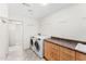 Laundry room with washer, dryer, and extra cabinet space at 7385 E Pleasant Run, Scottsdale, AZ 85258