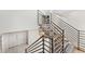 Modern metal staircase leading to the second floor at 7385 E Pleasant Run, Scottsdale, AZ 85258