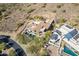An aerial view of the home showcasing its unique architecture and location at 11328 E Dreyfus Ave, Scottsdale, AZ 85259