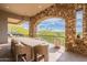 Outdoor dining area with scenic desert views at 11328 E Dreyfus Ave, Scottsdale, AZ 85259