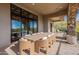 Outdoor seating and dining area on a spacious balcony at 11328 E Dreyfus Ave, Scottsdale, AZ 85259