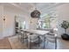Dining room with large window, showcasing a scenic outdoor view at 11328 E Dreyfus Ave, Scottsdale, AZ 85259