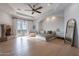 Spacious main bedroom with fireplace, balcony access, and ample natural light at 11328 E Dreyfus Ave, Scottsdale, AZ 85259