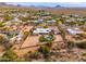 Aerial view of a home with a pool and desert landscape at 12550 E Silver Spur St, Scottsdale, AZ 85259