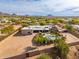 Aerial view of a home with a pool and desert landscape at 12550 E Silver Spur St, Scottsdale, AZ 85259