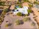 Aerial view of a home with a pool and desert landscape at 12550 E Silver Spur St, Scottsdale, AZ 85259