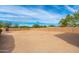 Empty lot with block wall and partial view of the property at 12550 E Silver Spur St, Scottsdale, AZ 85259