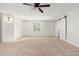 Finished basement bedroom with window and barn door at 12550 E Silver Spur St, Scottsdale, AZ 85259