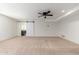 Finished basement room with carpeted floor and ceiling fan at 12550 E Silver Spur St, Scottsdale, AZ 85259