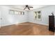 Bright bedroom with hardwood floors and plantation shutters at 12550 E Silver Spur St, Scottsdale, AZ 85259