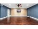 Spacious bedroom with hardwood floors and ceiling fan at 12550 E Silver Spur St, Scottsdale, AZ 85259