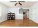 Spacious bedroom with hardwood floors and built-in shelving at 12550 E Silver Spur St, Scottsdale, AZ 85259